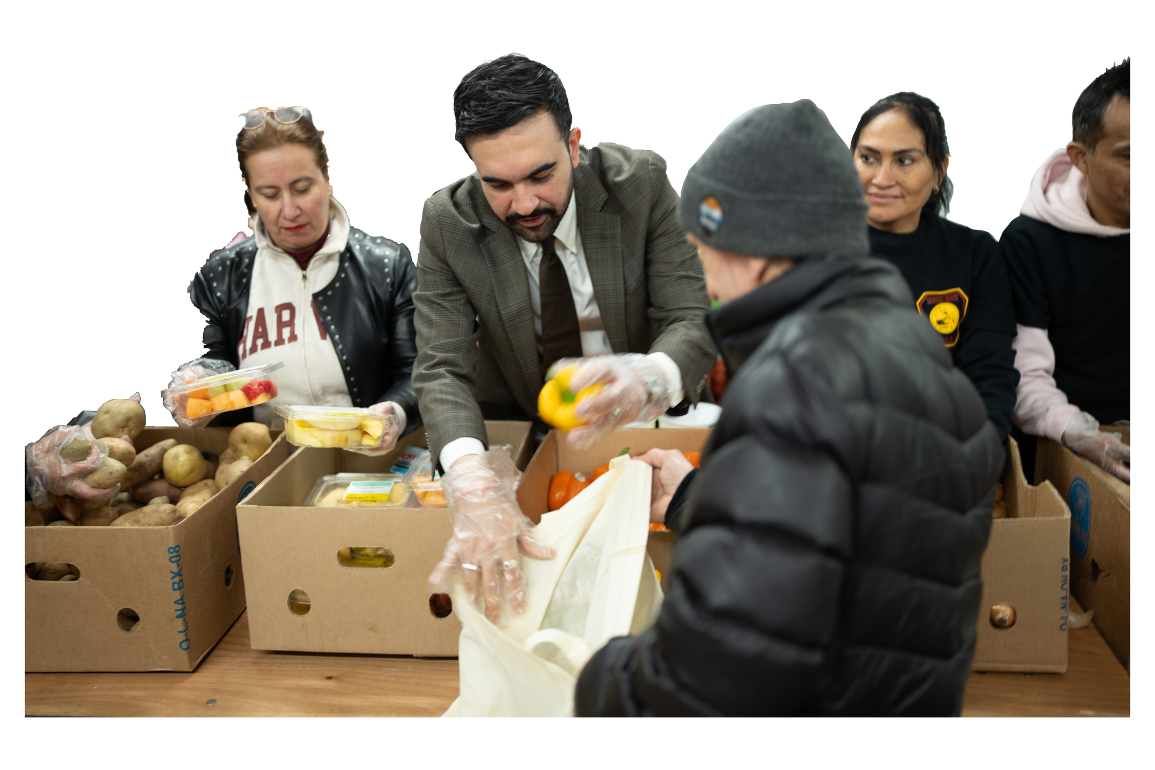 Volunteers handing out food at a distribution site
